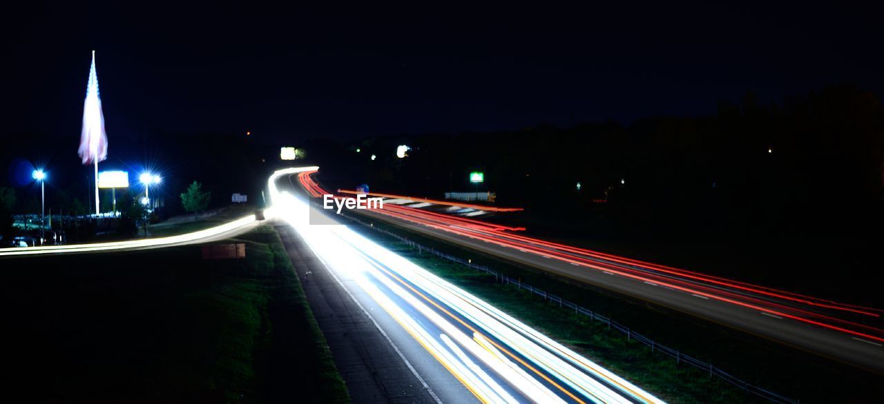 Light trails on road at night