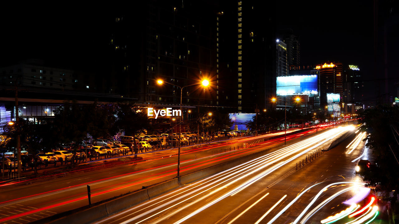 Light trails on city street at night