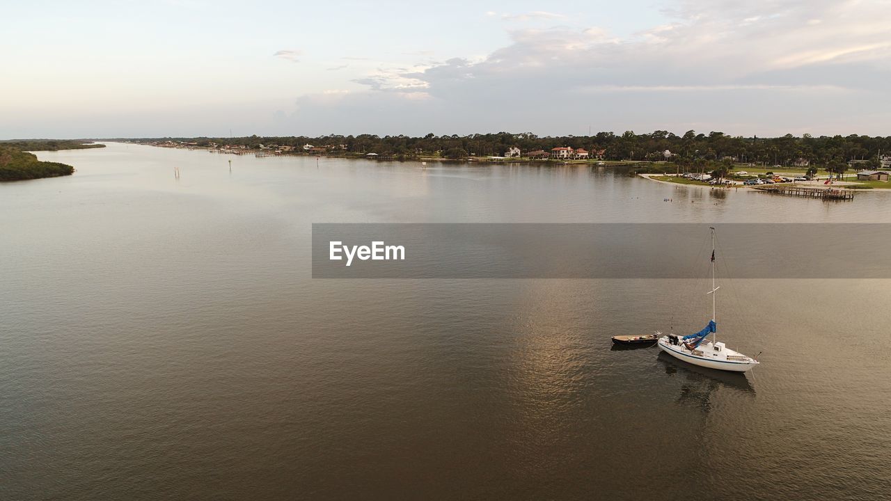 High angle view of nautical vessel on river against sky