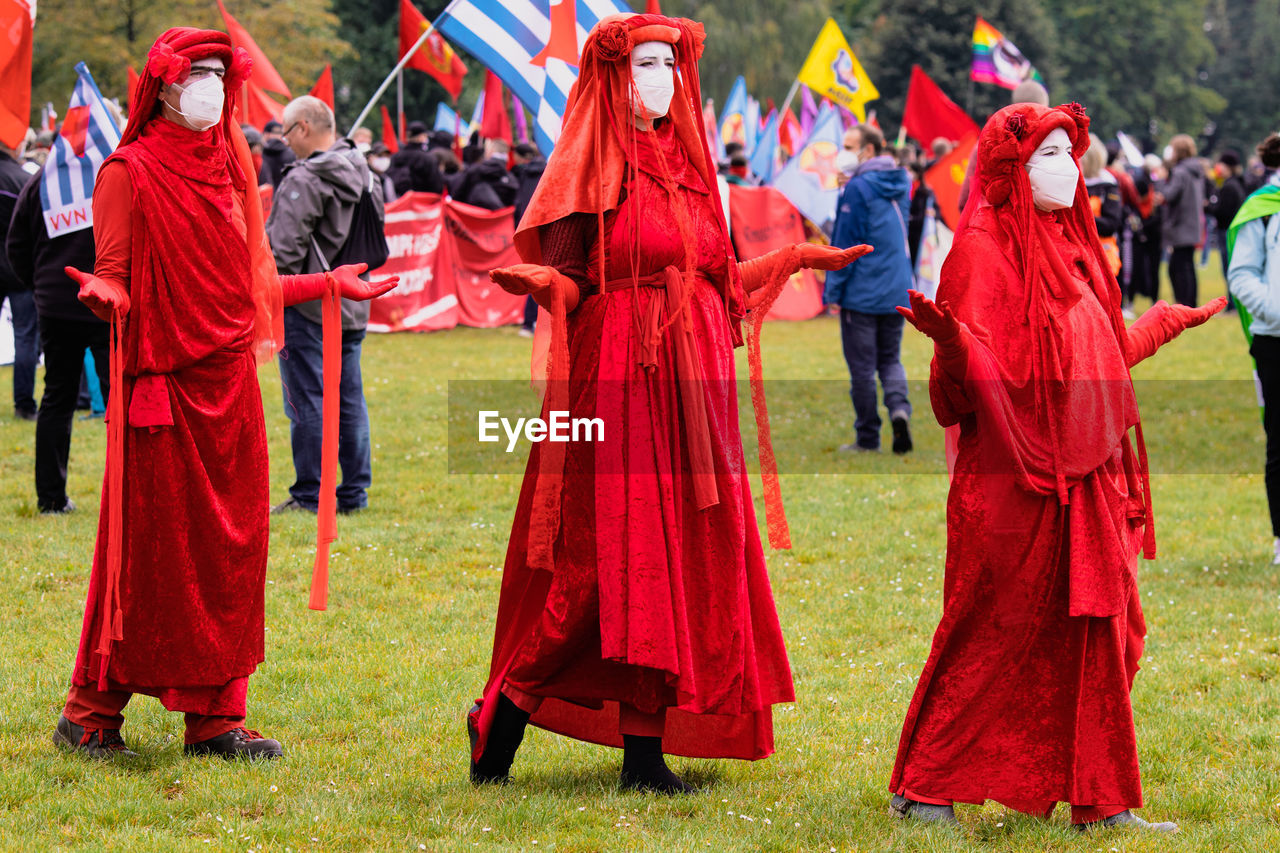 GROUP OF PEOPLE IN TRADITIONAL CLOTHING