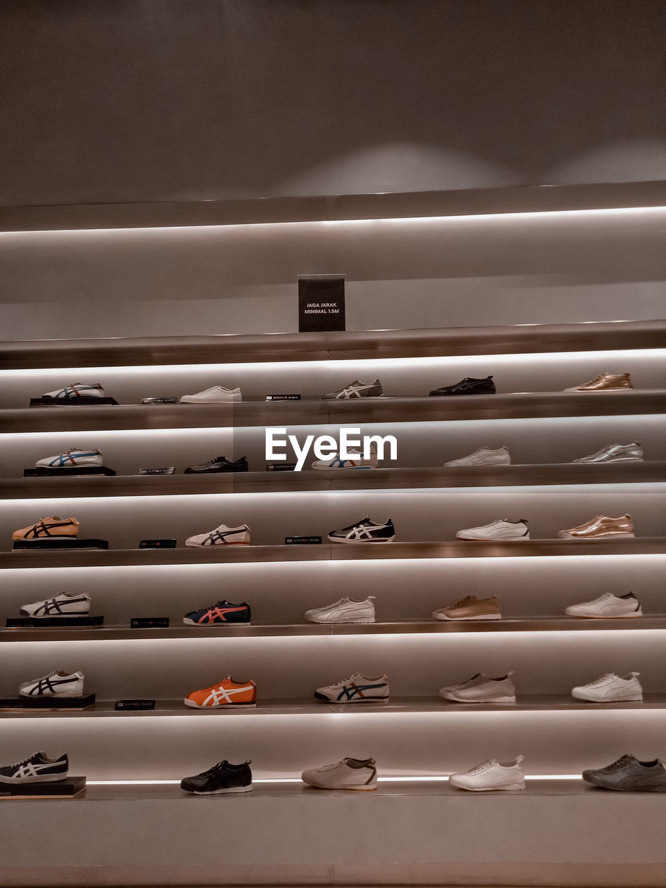 STACK OF EMPTY SEATS IN SHELF