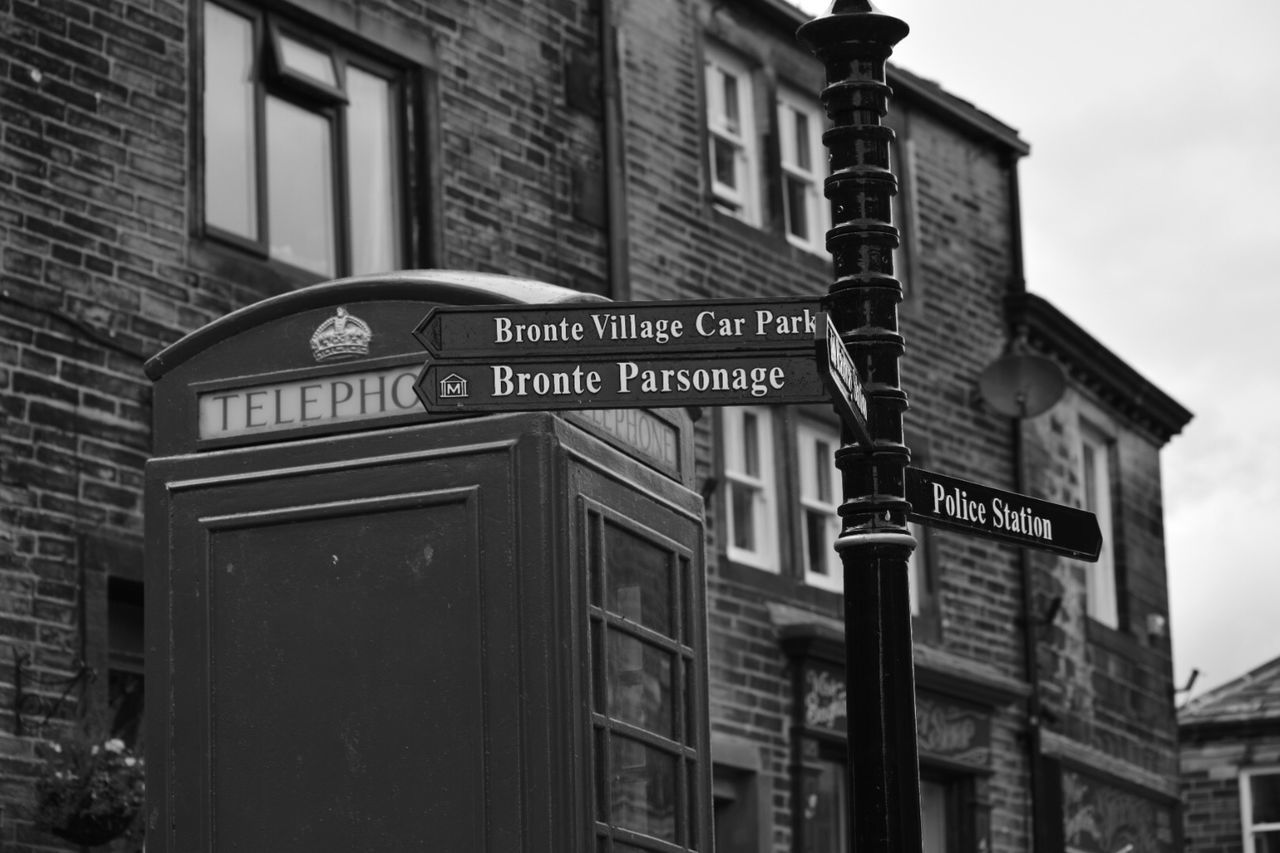 LOW ANGLE VIEW OF SIGN BOARD