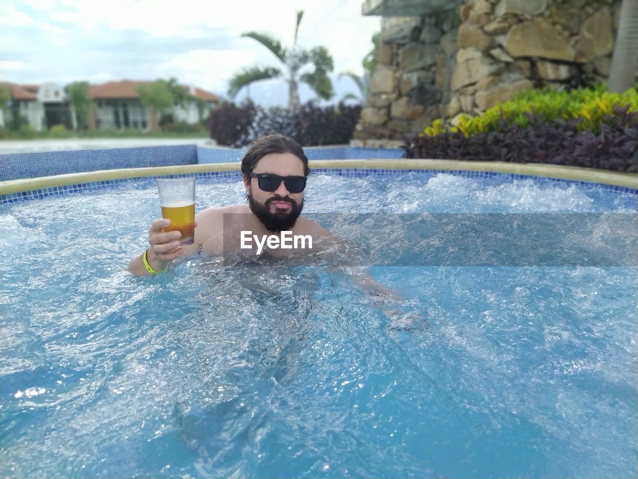 Portrait of man in swimming pool