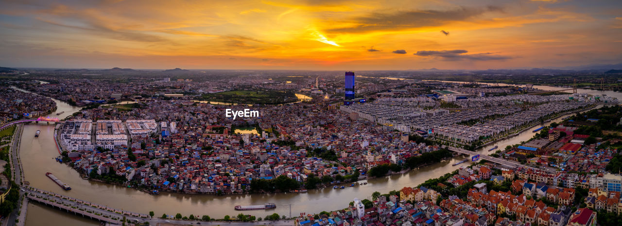 High angle view of townscape against sky during sunset