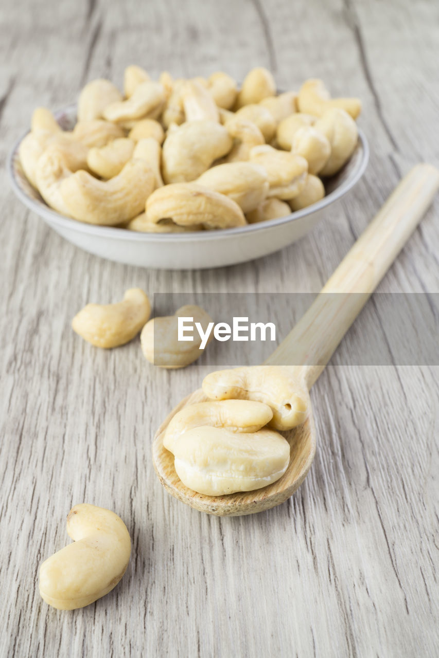 CLOSE-UP OF FOOD ON WOODEN TABLE