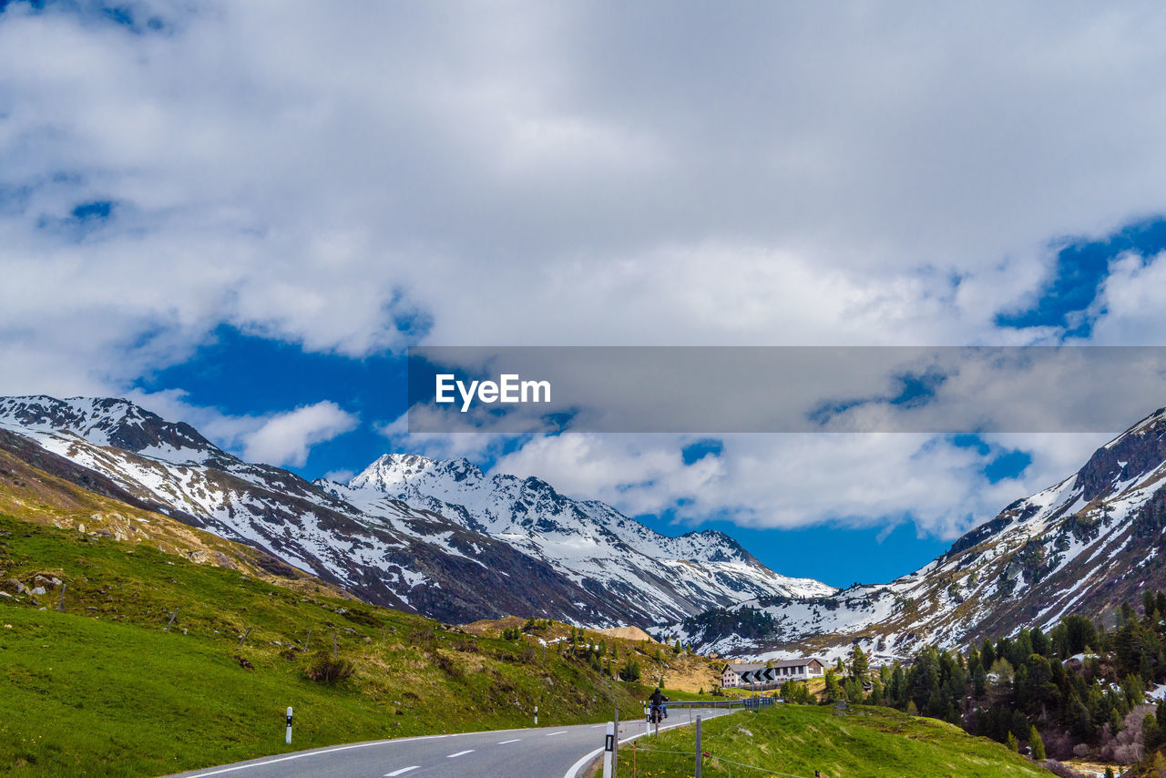 SCENIC VIEW OF SNOWCAPPED MOUNTAIN AGAINST SKY