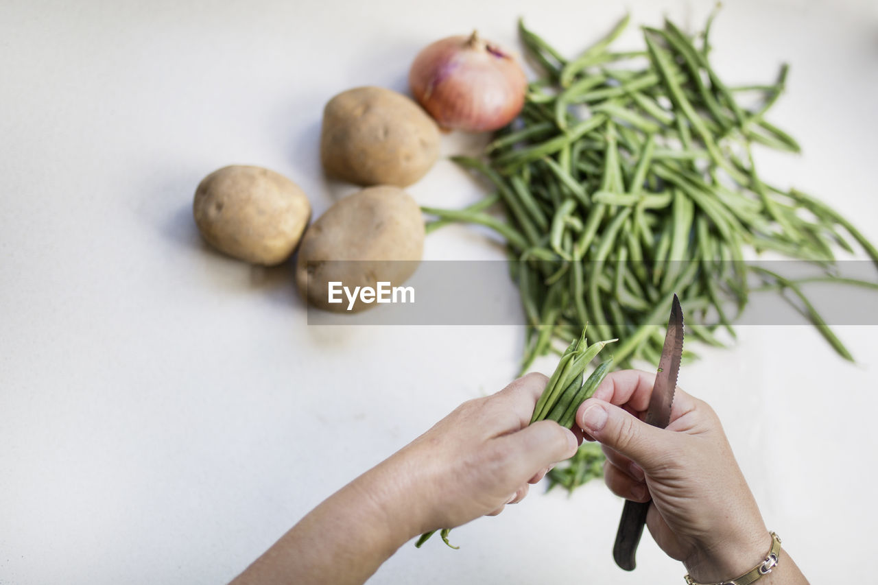 High angle view of person preparing food