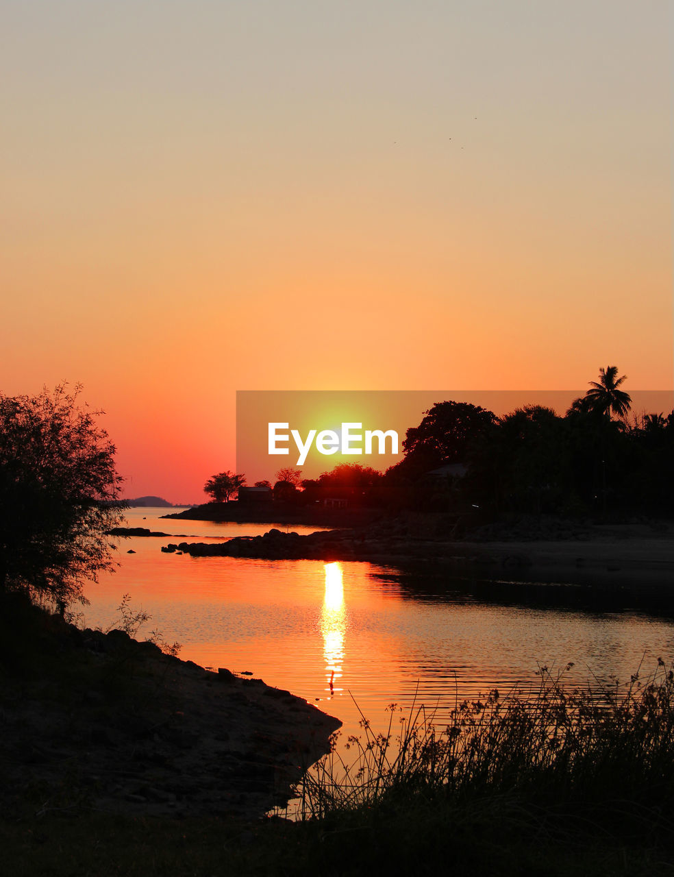 SCENIC VIEW OF LAKE AGAINST ROMANTIC SKY