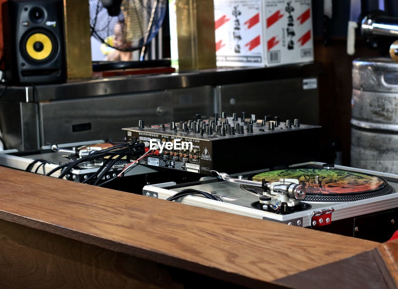 Turntable and sound mixer in recording studio