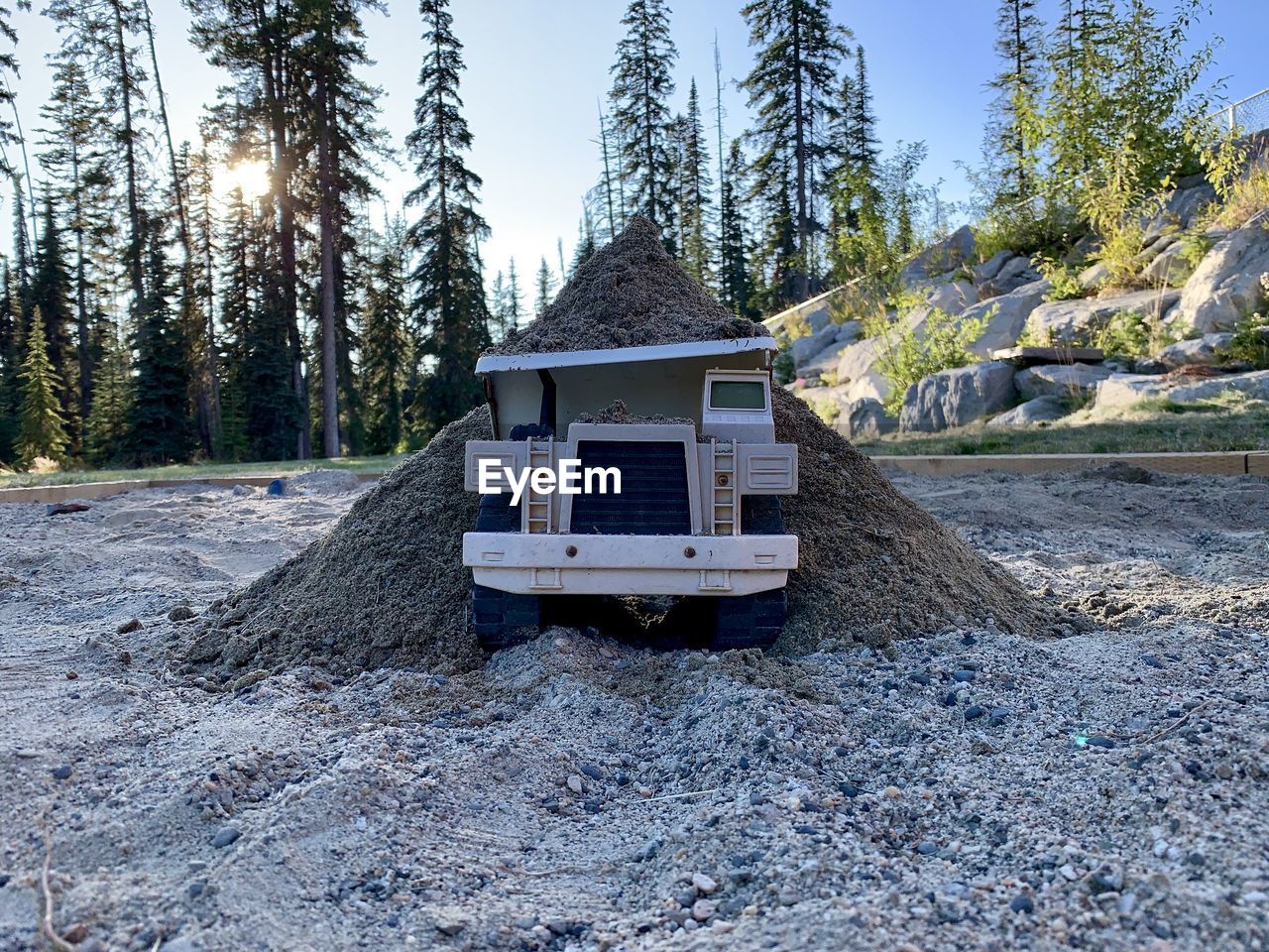 Toy truck under full load of sand