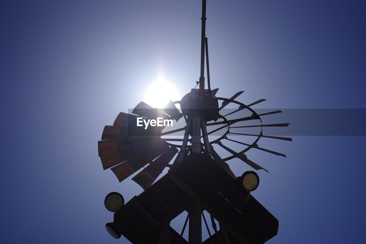 LOW ANGLE VIEW OF COMMUNICATIONS TOWER AGAINST CLEAR SKY