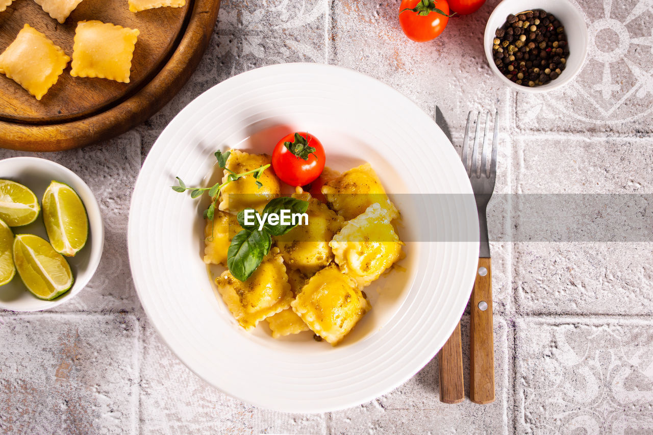 directly above shot of food served in plate on table