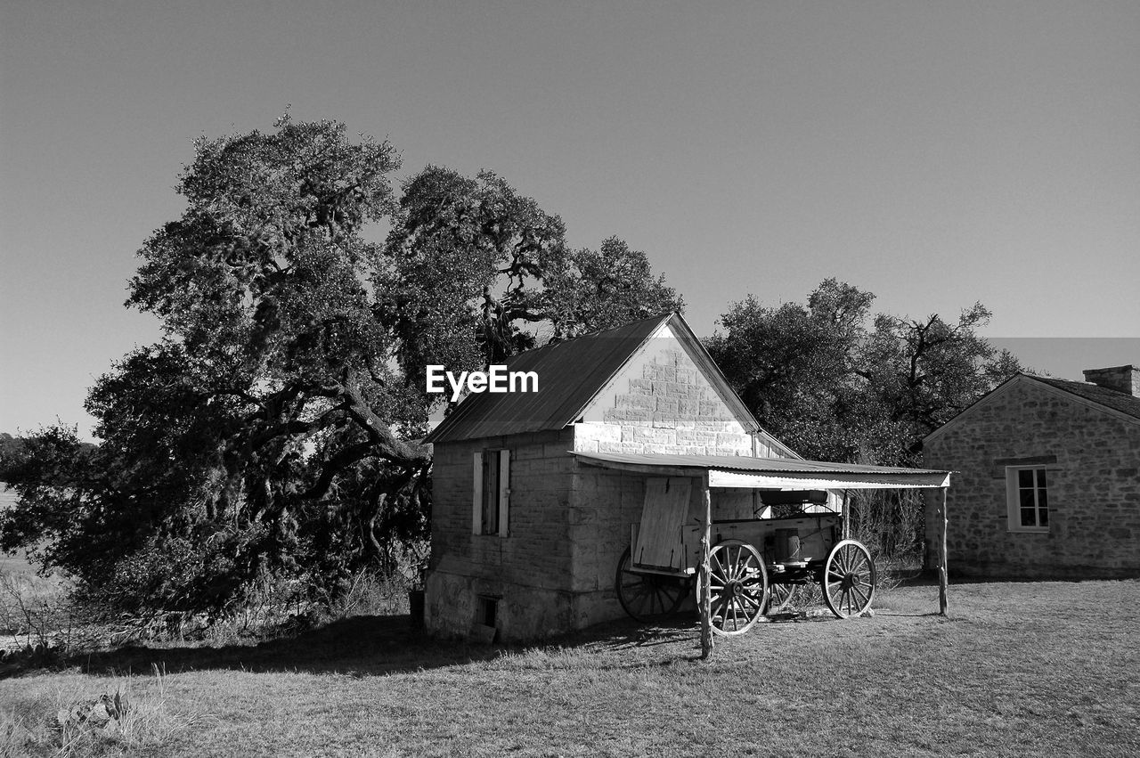 Old wagon at a ghost town ranch house