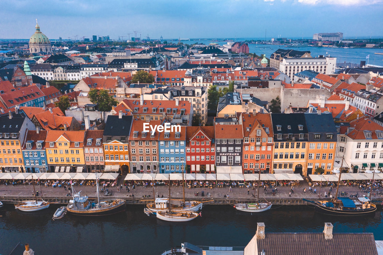 Famous nyhavn pier with colorful buildings and boats in copenhagen, denmark.