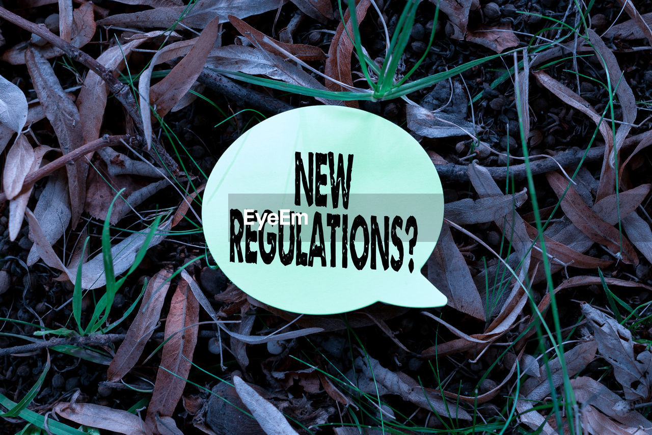 HIGH ANGLE VIEW OF SIGN ON FIELD