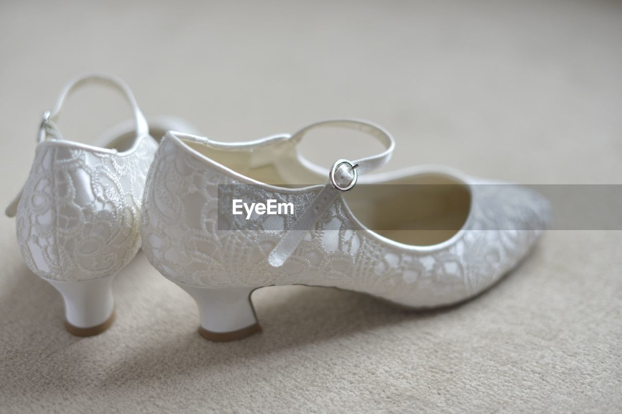 Close-up of shoes on table