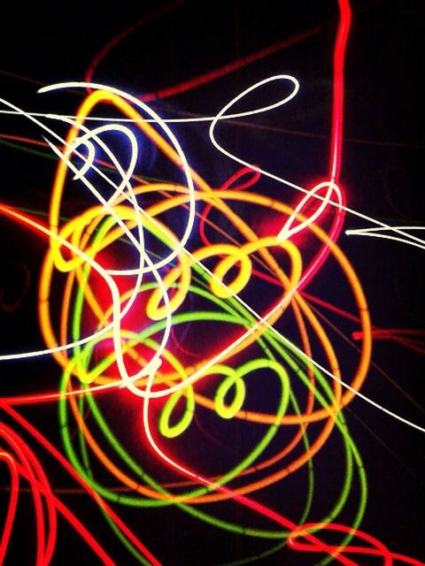 LIGHT TRAILS ON COLORFUL LIGHT PAINTING