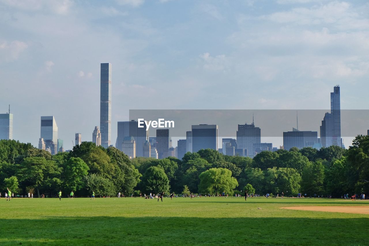 Park with skyscrapers in background