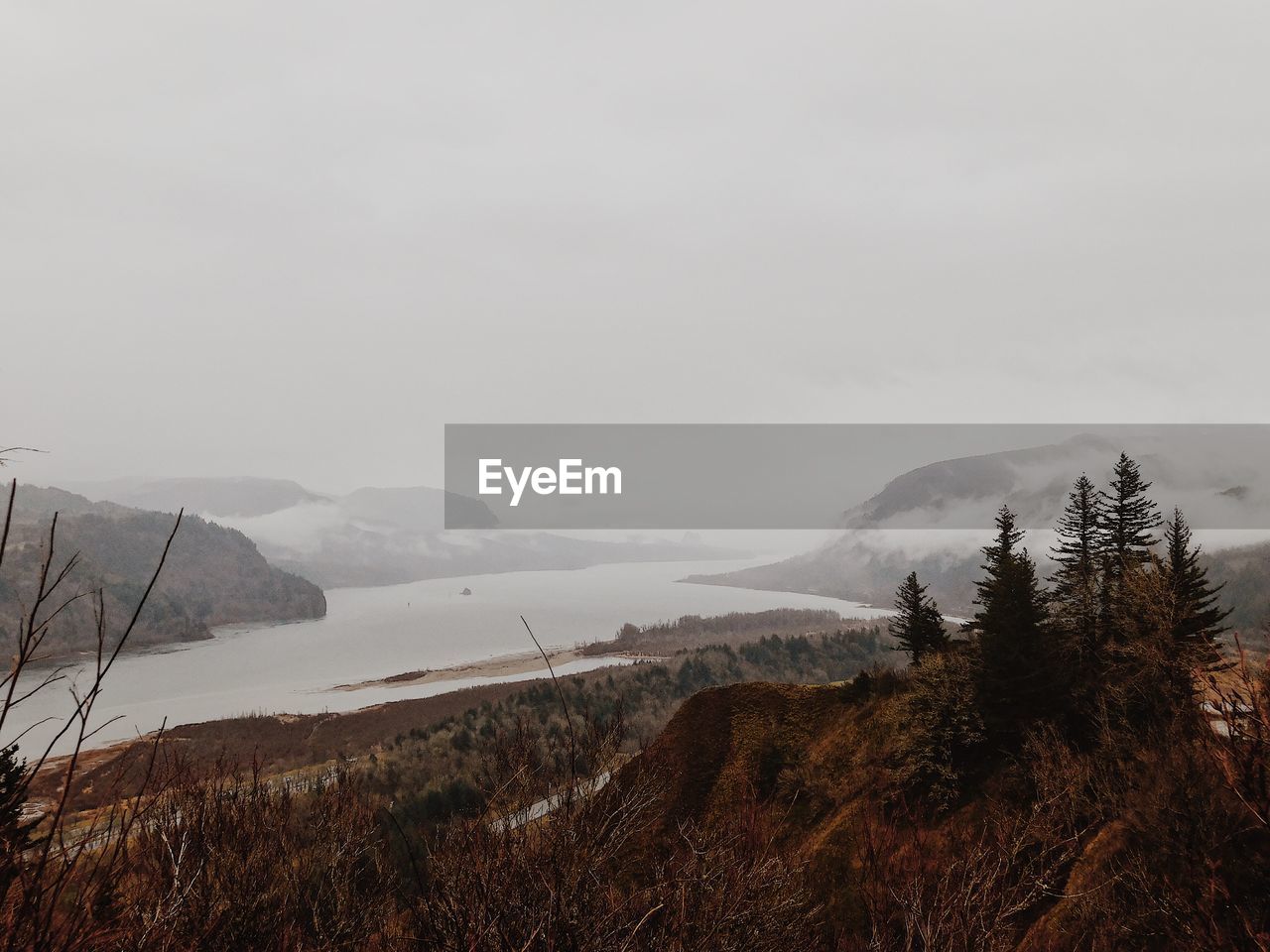 Scenic view of mountains against sky during winter