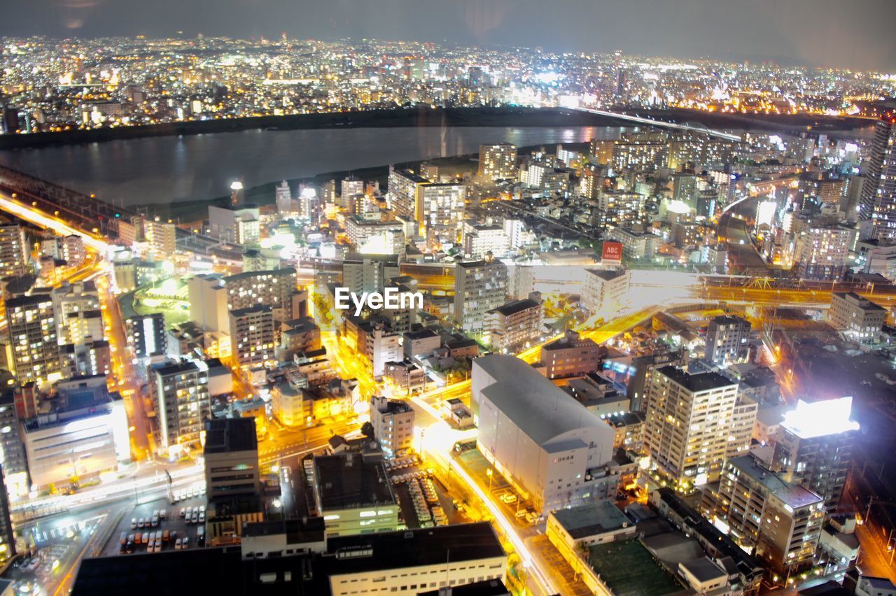 ILLUMINATED CITYSCAPE AT NIGHT