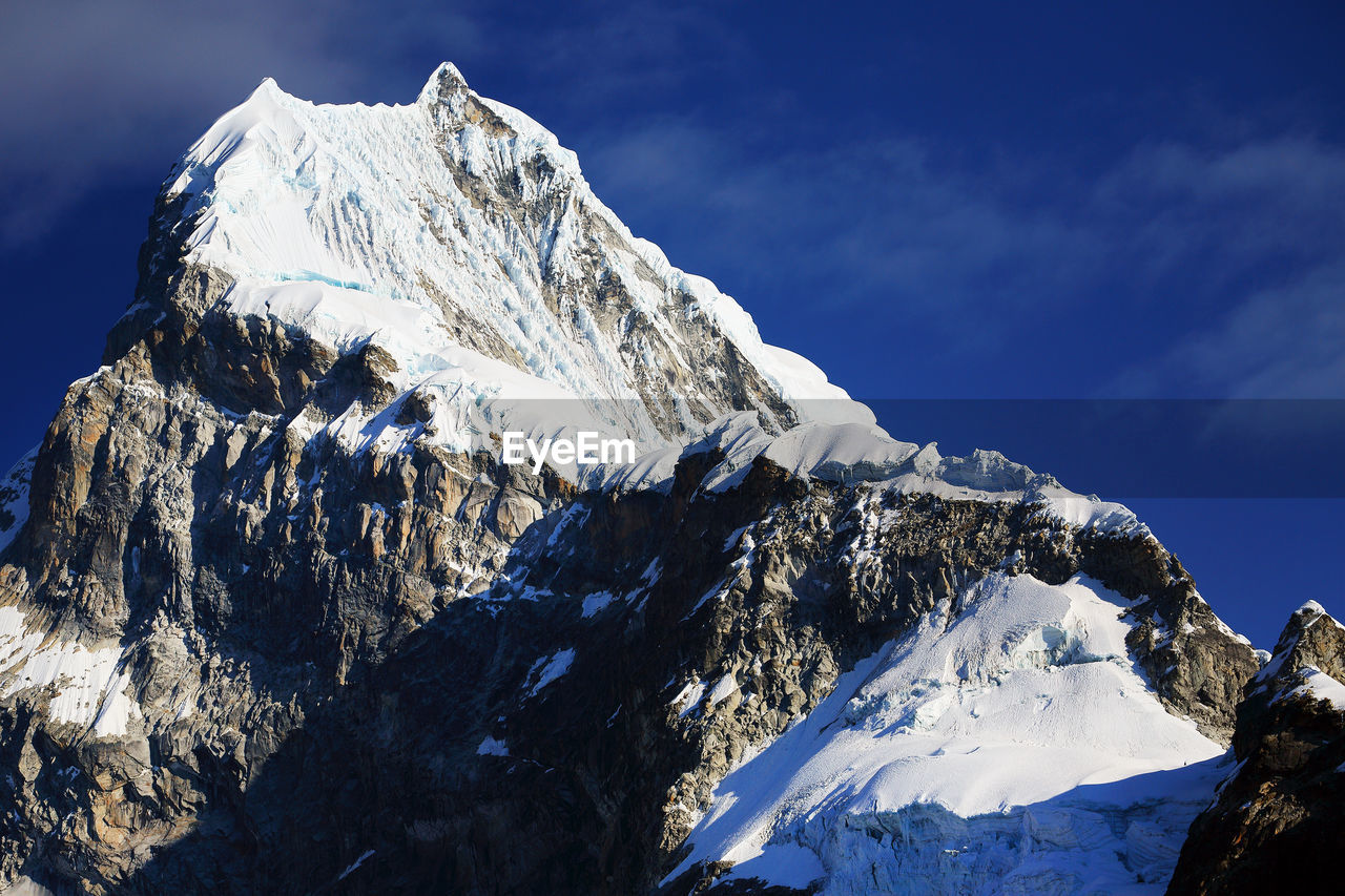 View of snowcapped mountain peak 