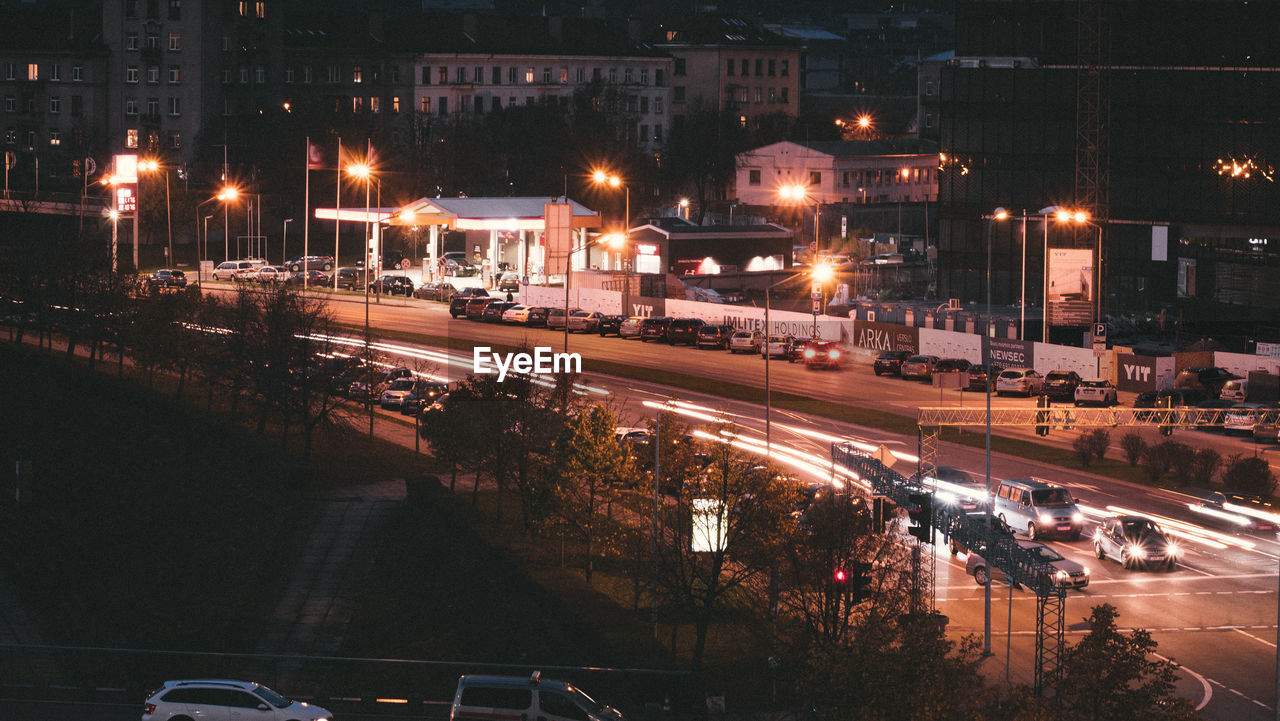 High angle view of light trails on road at night