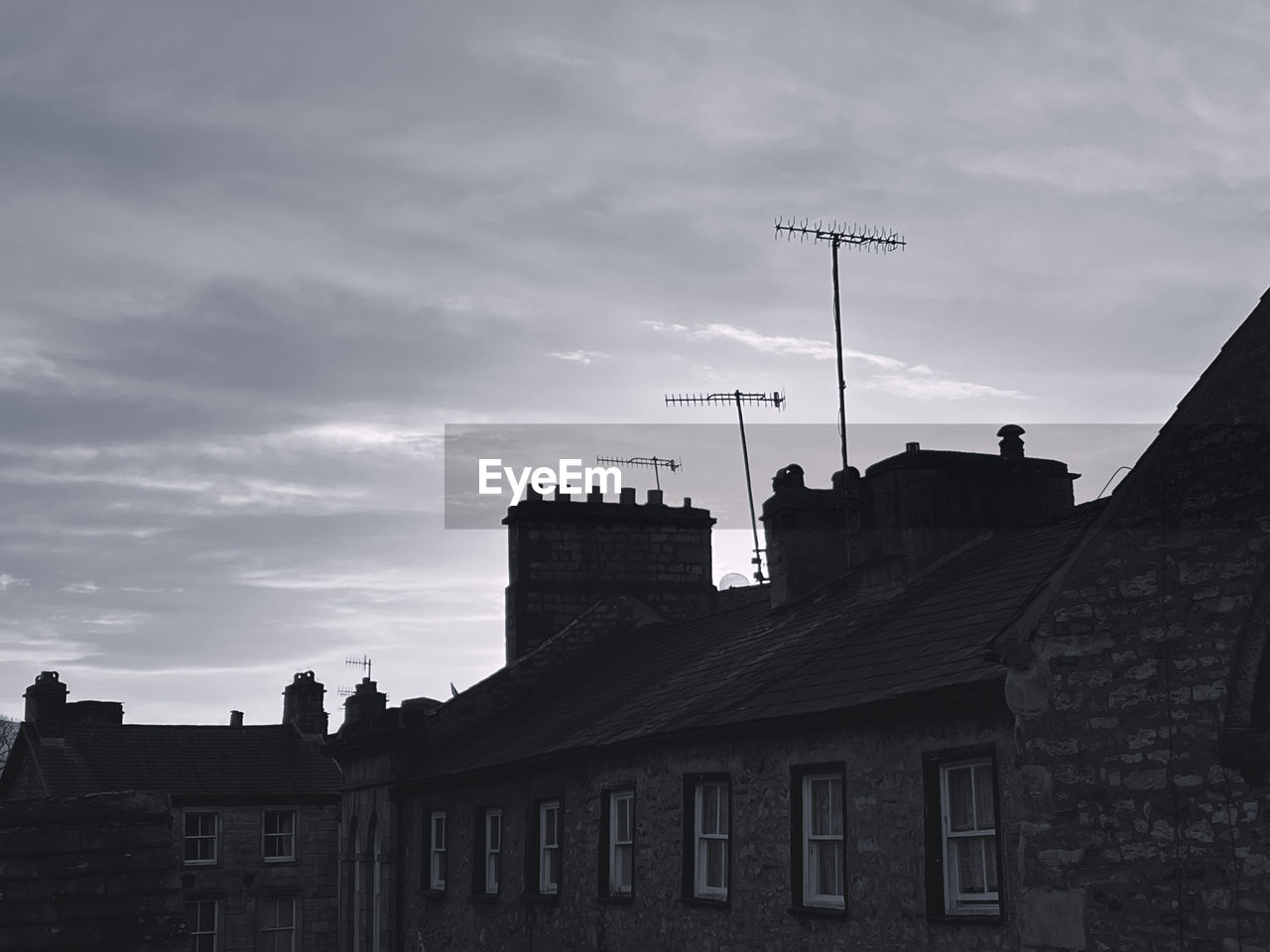 architecture, built structure, building exterior, sky, building, cloud, nature, city, black and white, history, no people, the past, low angle view, monochrome, house, outdoors, silhouette, travel destinations, residential district, monochrome photography, black, roof, darkness