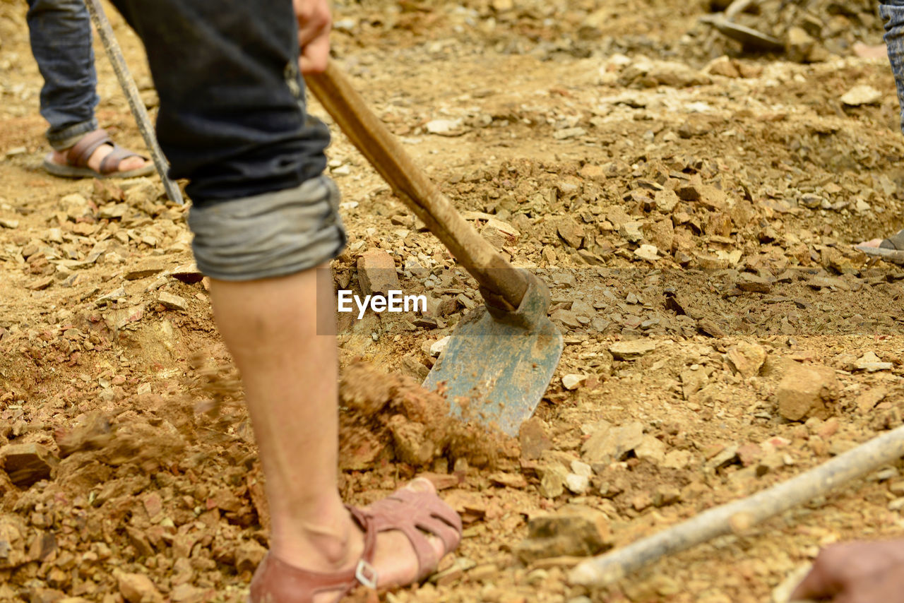 LOW SECTION OF MAN WORKING