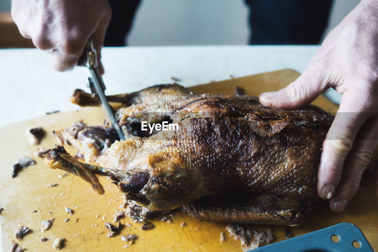 Close-up of hand preparing christmas food