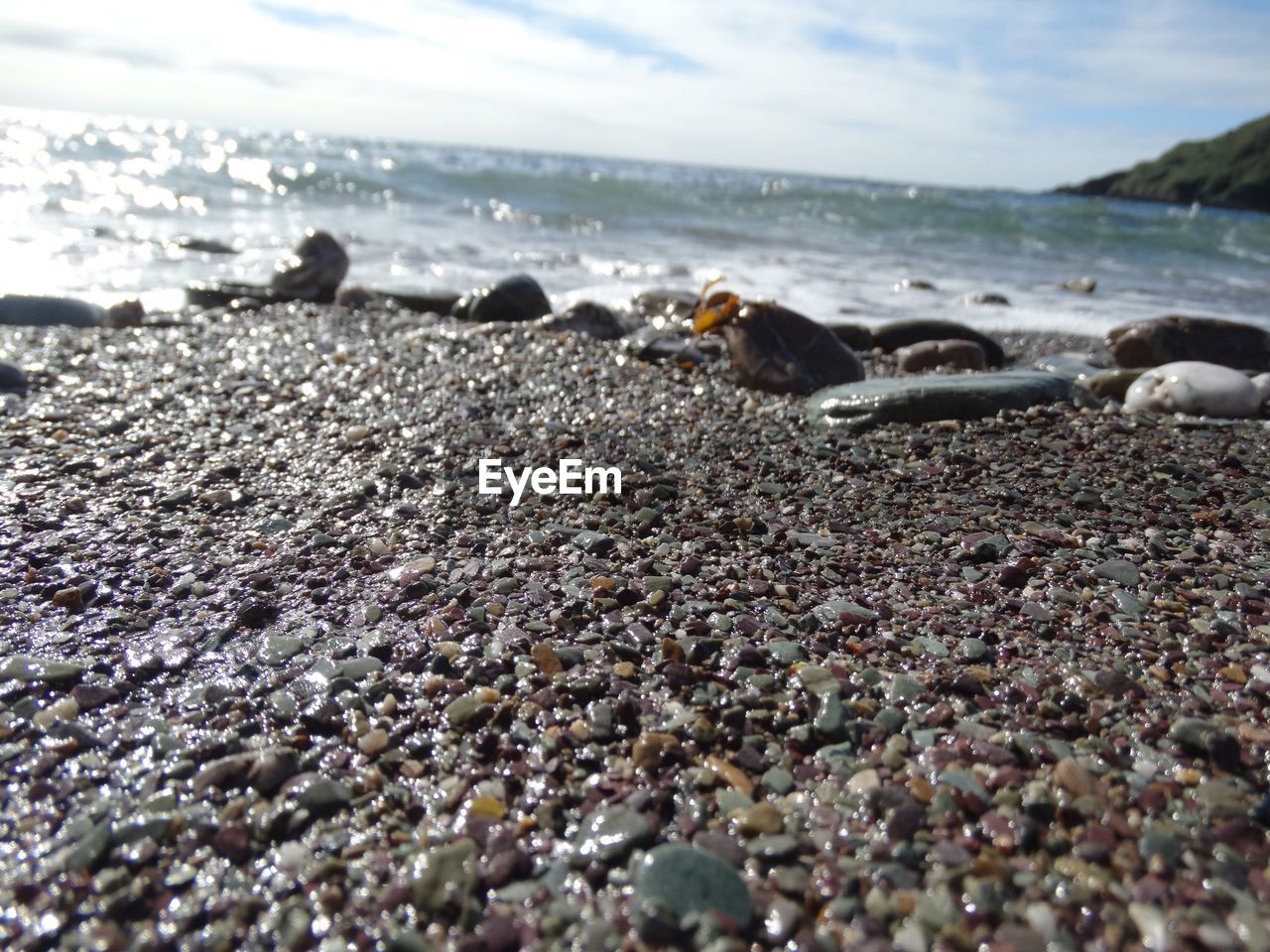 SURFACE LEVEL OF PEBBLES ON SHORE