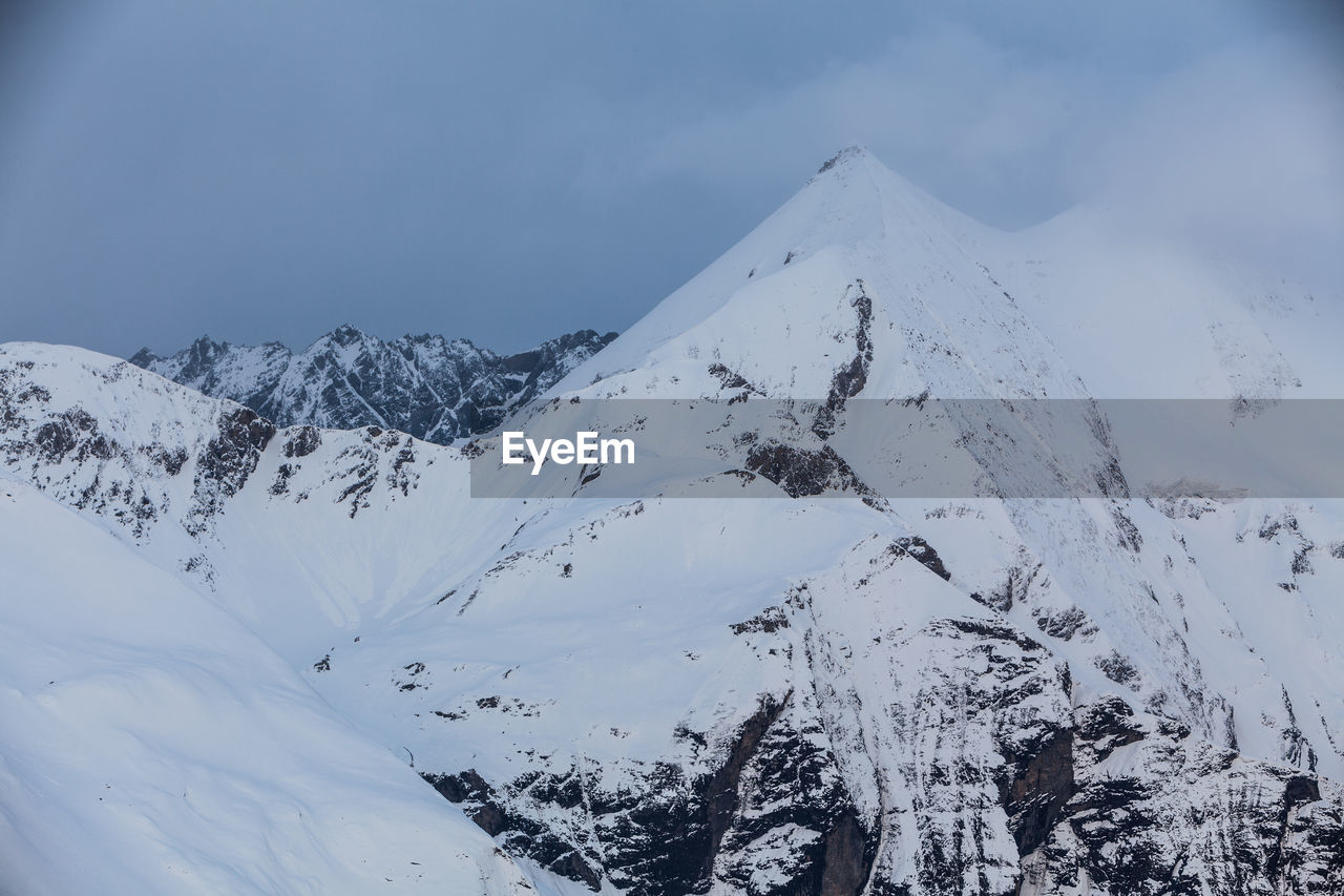 Scenic view of snow covered mountains against sky, view from edelweissspitze, alps, austria