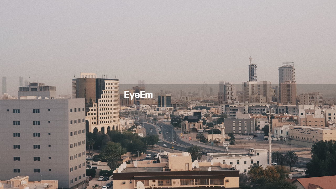 Cityscape against clear sky