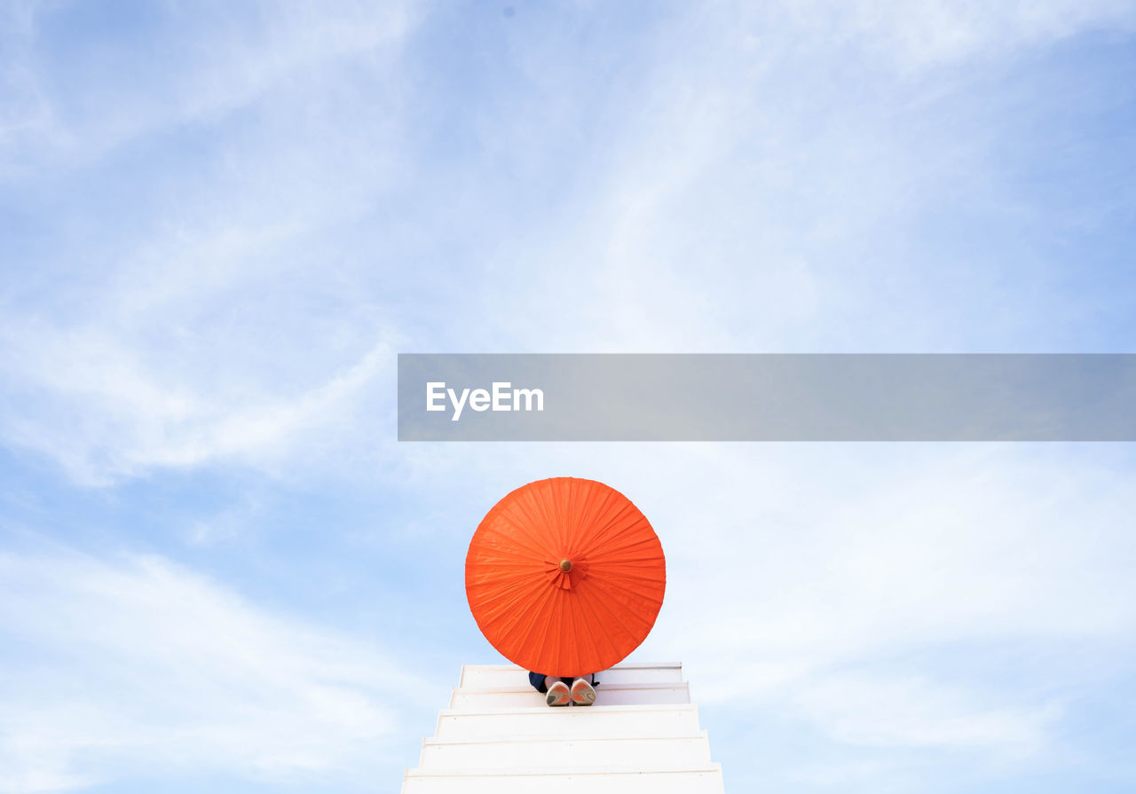 LOW ANGLE VIEW OF BALLOON AGAINST SKY