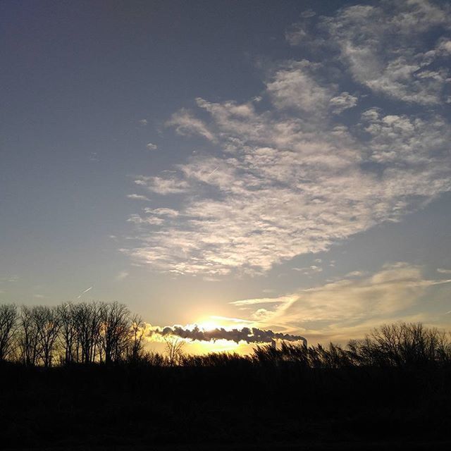 SCENIC VIEW OF LANDSCAPE AT SUNSET