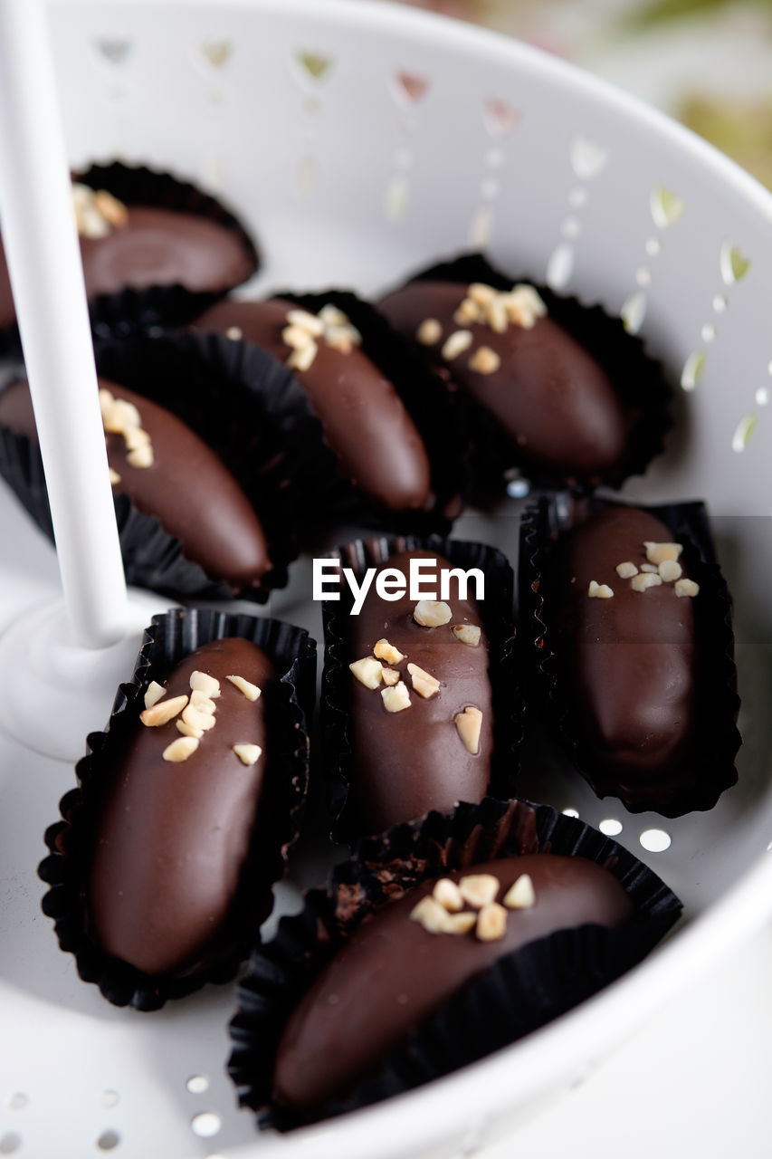 High angle view of chocolates in container