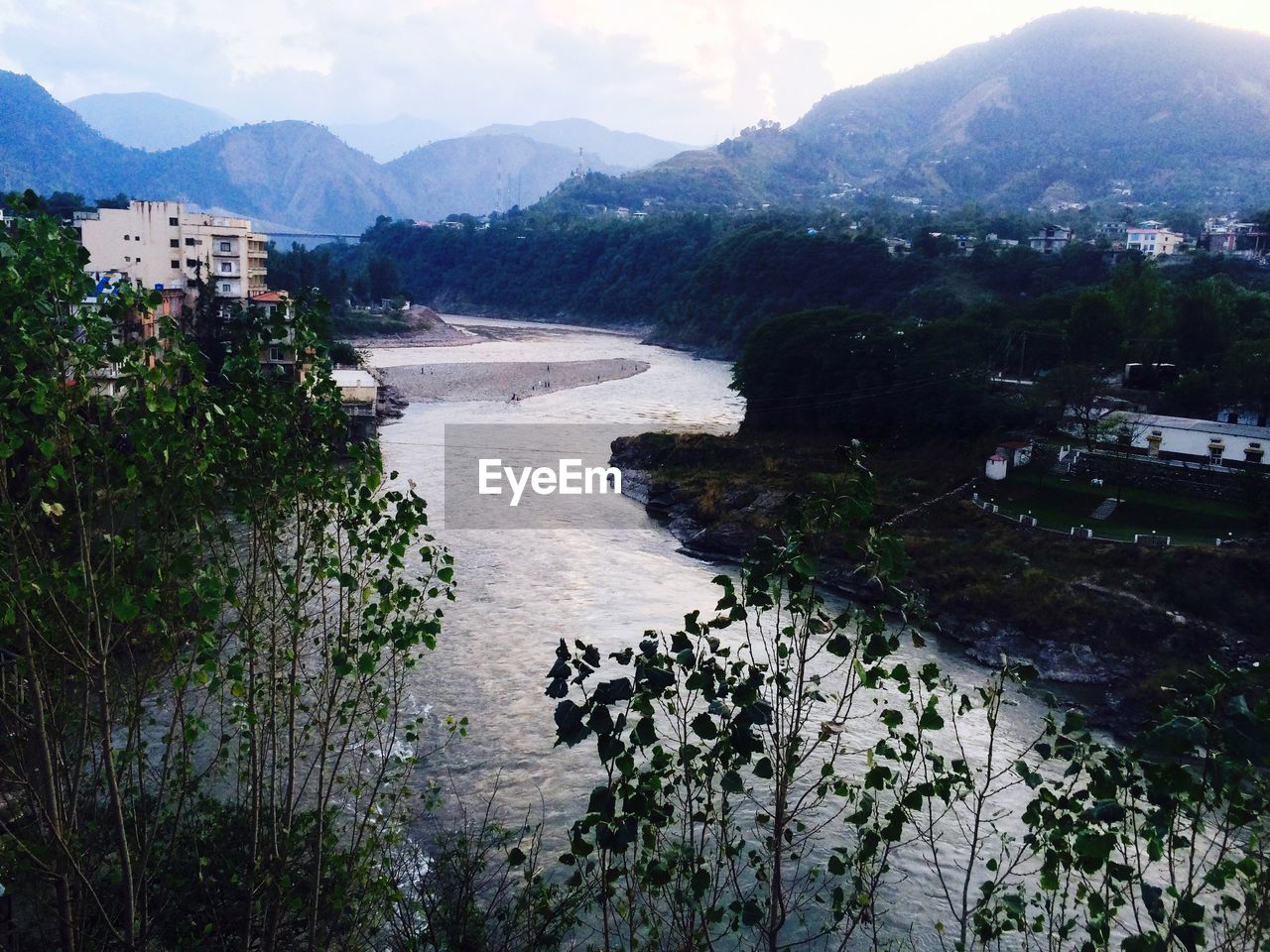 SCENIC VIEW OF MOUNTAINS AND RIVER