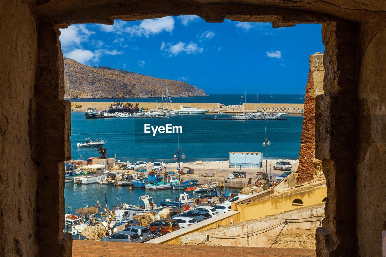 Glimpse of a small port of a town on the sicilian coast