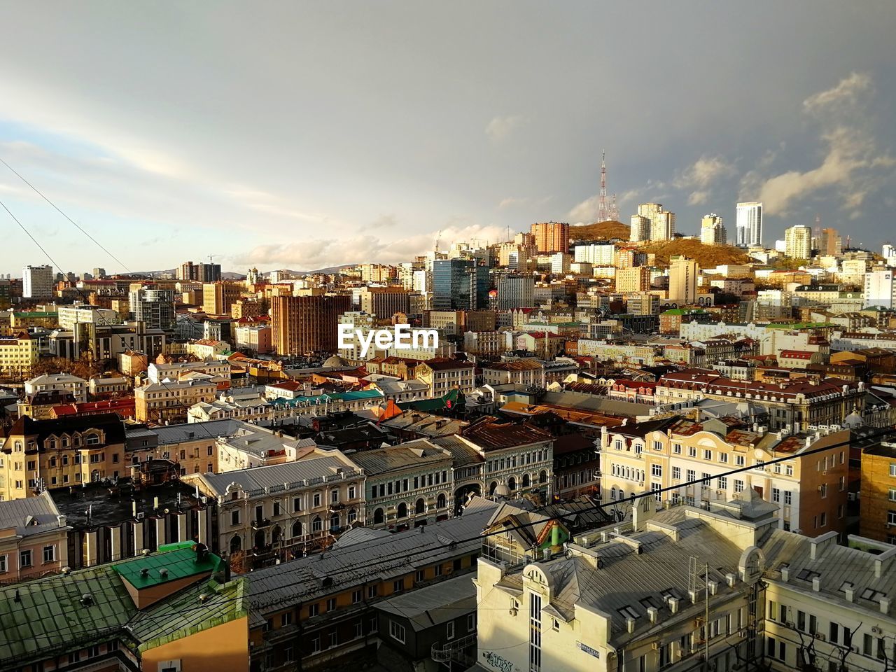 HIGH ANGLE VIEW OF CITY BUILDINGS AGAINST SKY