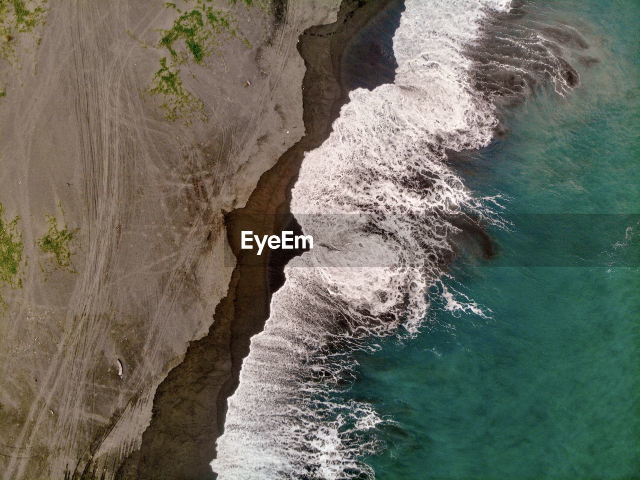 High angle view of rock formation in sea