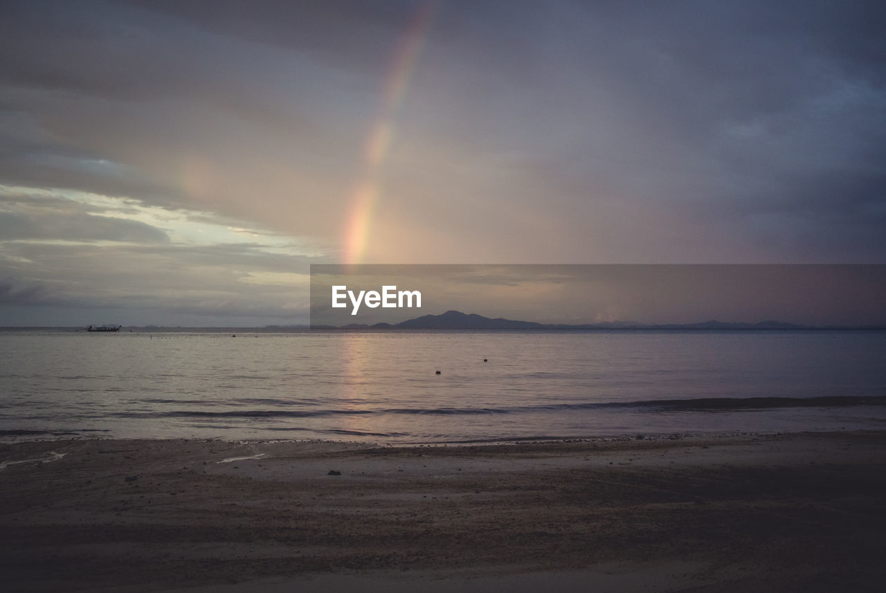 Scenic view of sea against sky at sunset