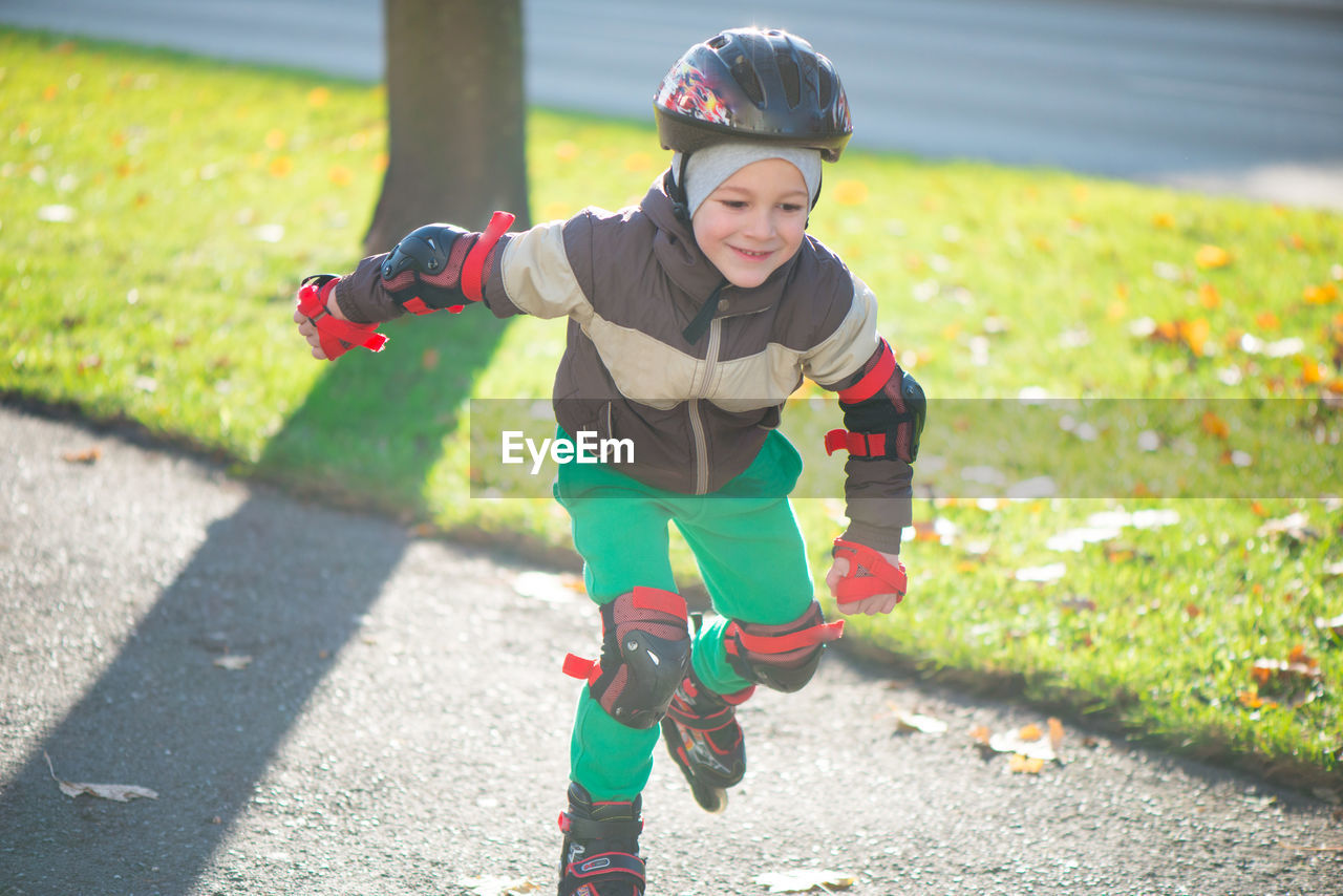 Full length of boy skating at park