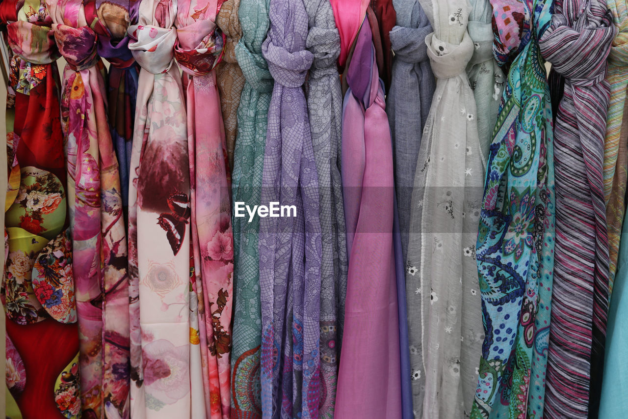 Full frame shot of multi colored clothing for sale in market