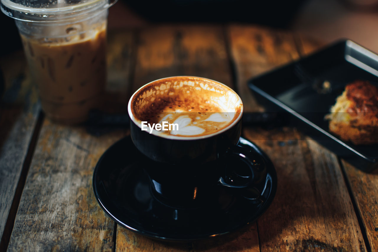 Close-up of coffee cup on table