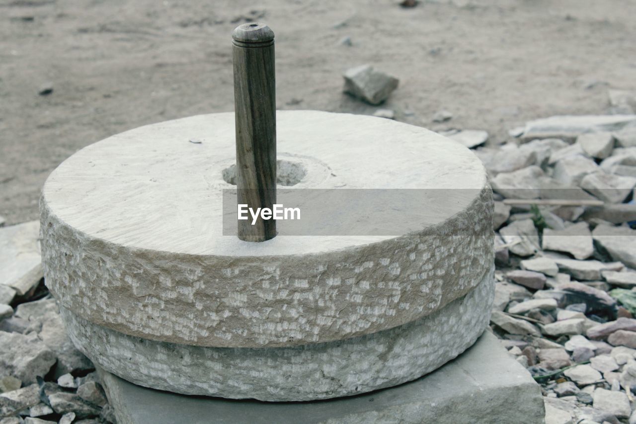 Close-up of old-fashioned stone wheat grinder