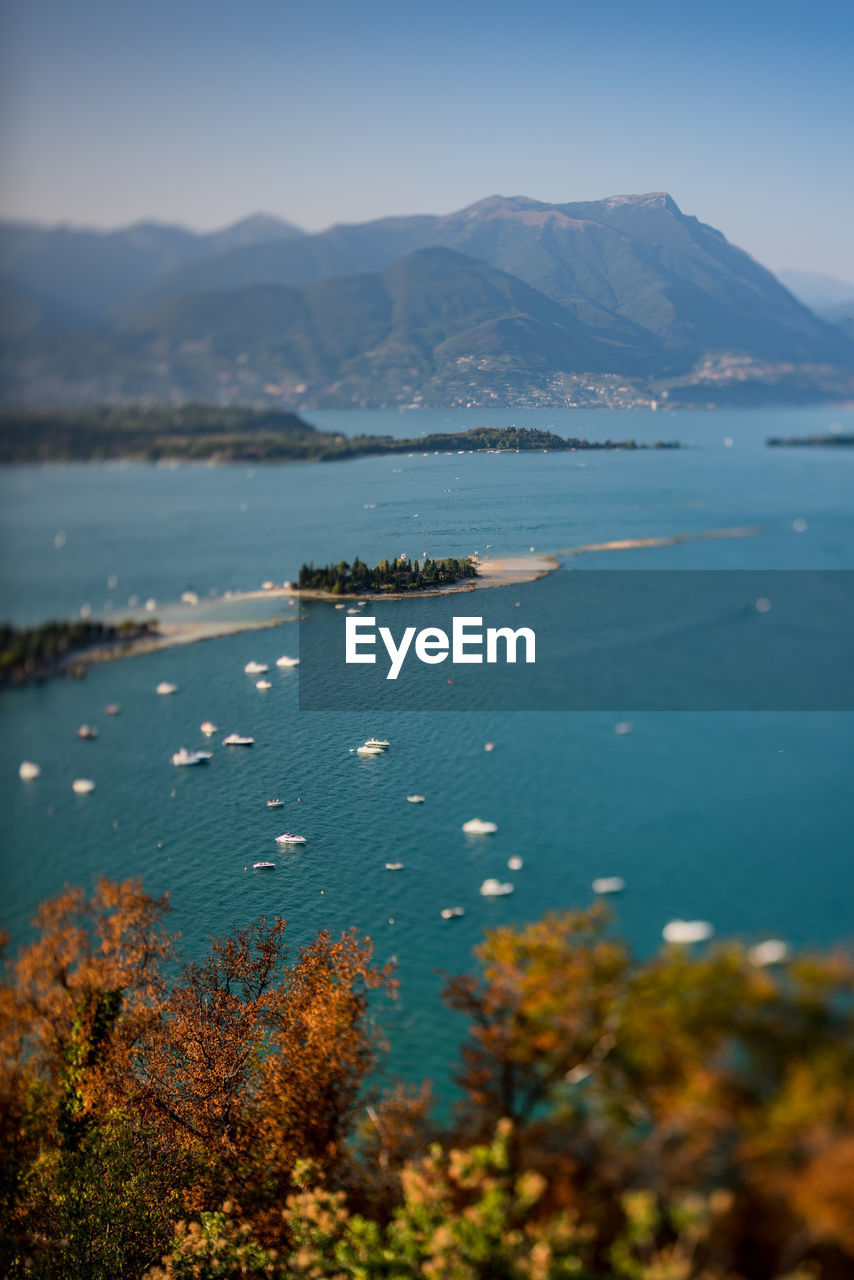 Scenic view of sea with mountains in background