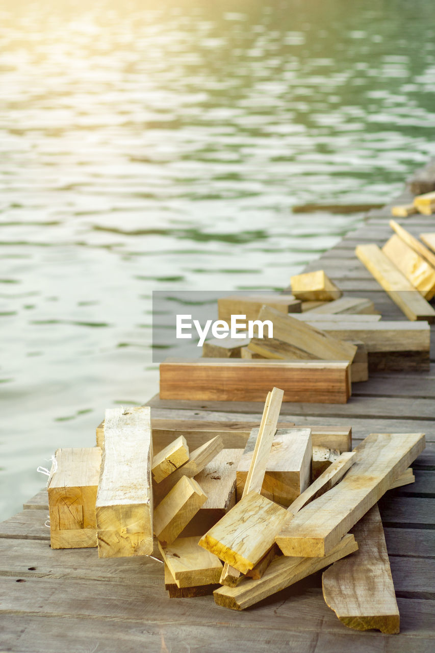 close-up of wooden pier over lake
