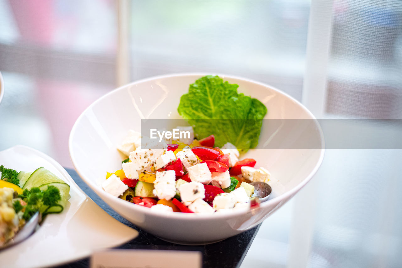 food and drink, food, healthy eating, vegetable, wellbeing, salad, meal, freshness, fruit, dish, bowl, indoors, produce, breakfast, table, lunch, plate, no people, green, cuisine, herb, tomato, salad bowl, lettuce, dairy, vegetarian food, organic