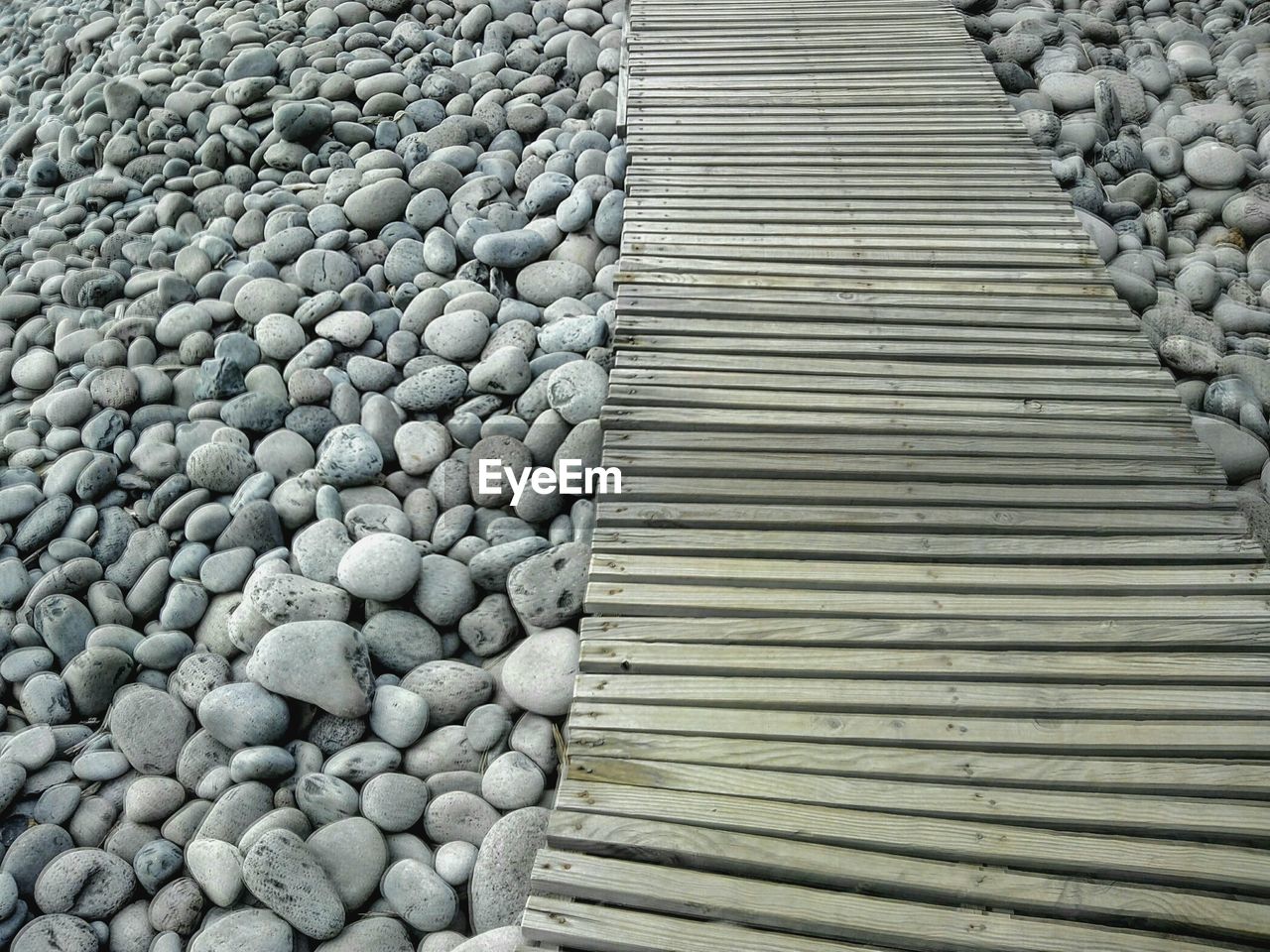 High angle view of boardwalk at beach