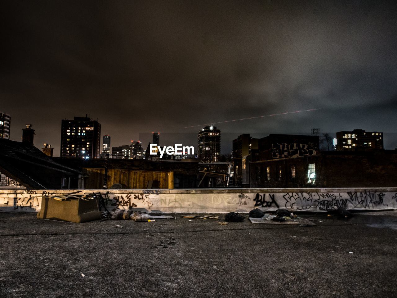 ILLUMINATED CITYSCAPE AT NIGHT