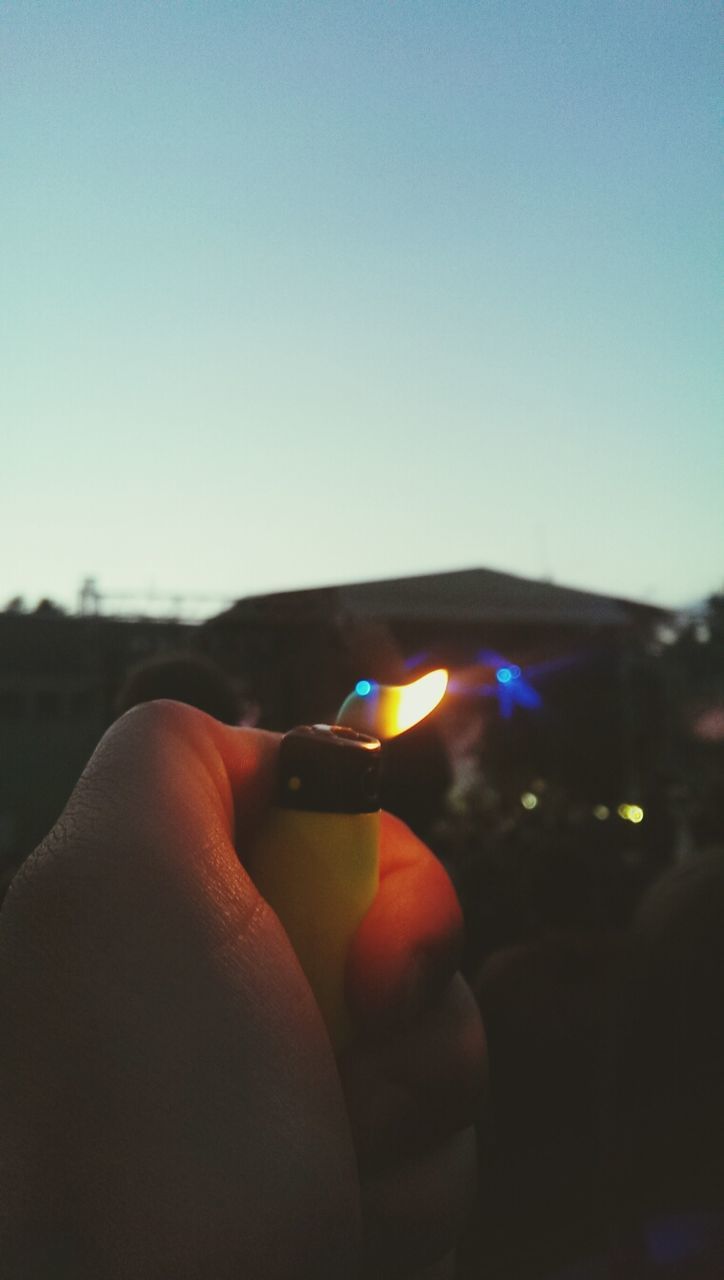 Man holding cigarette lighter